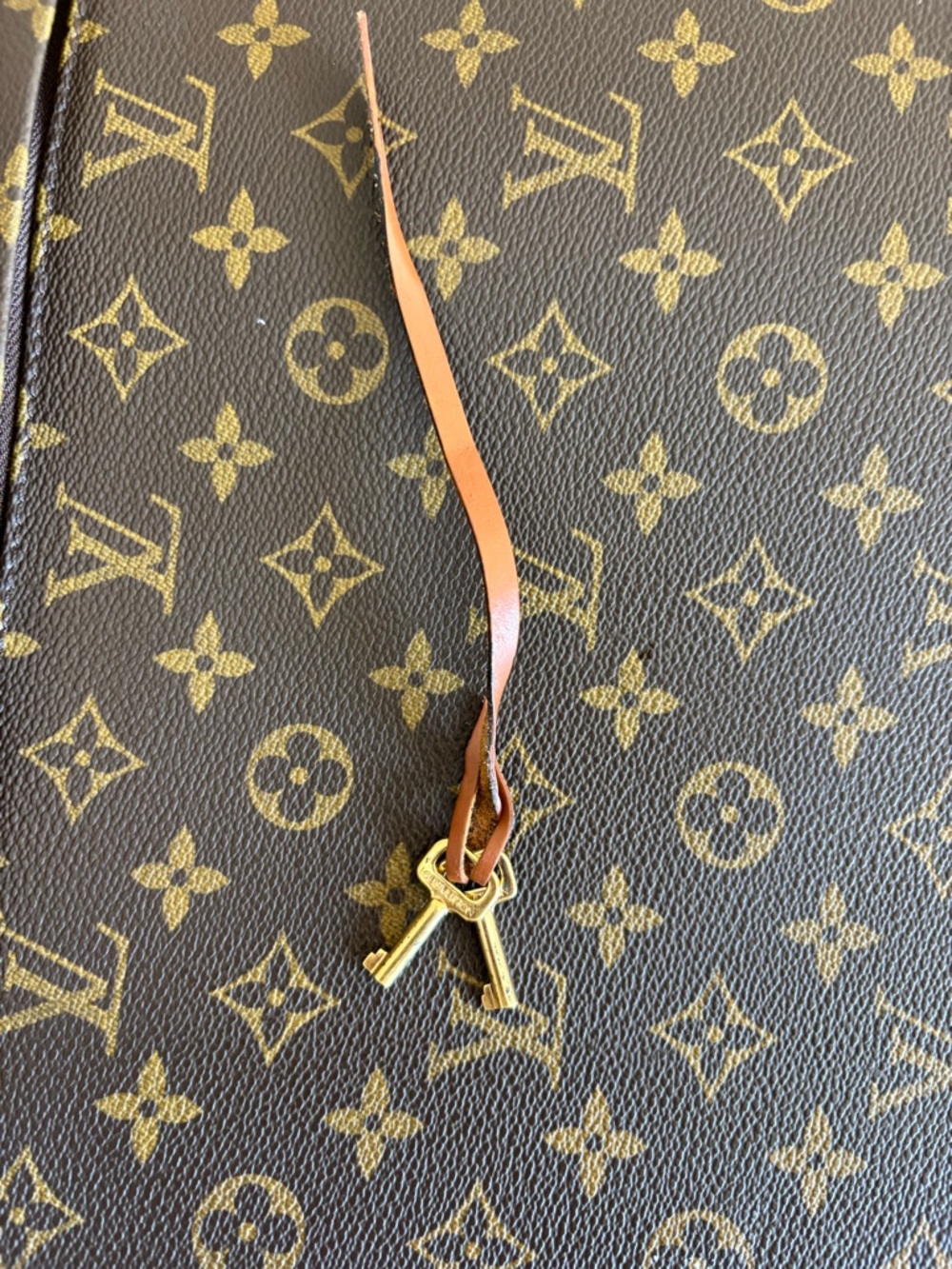 Authentic Louis Vuitton briefcase key